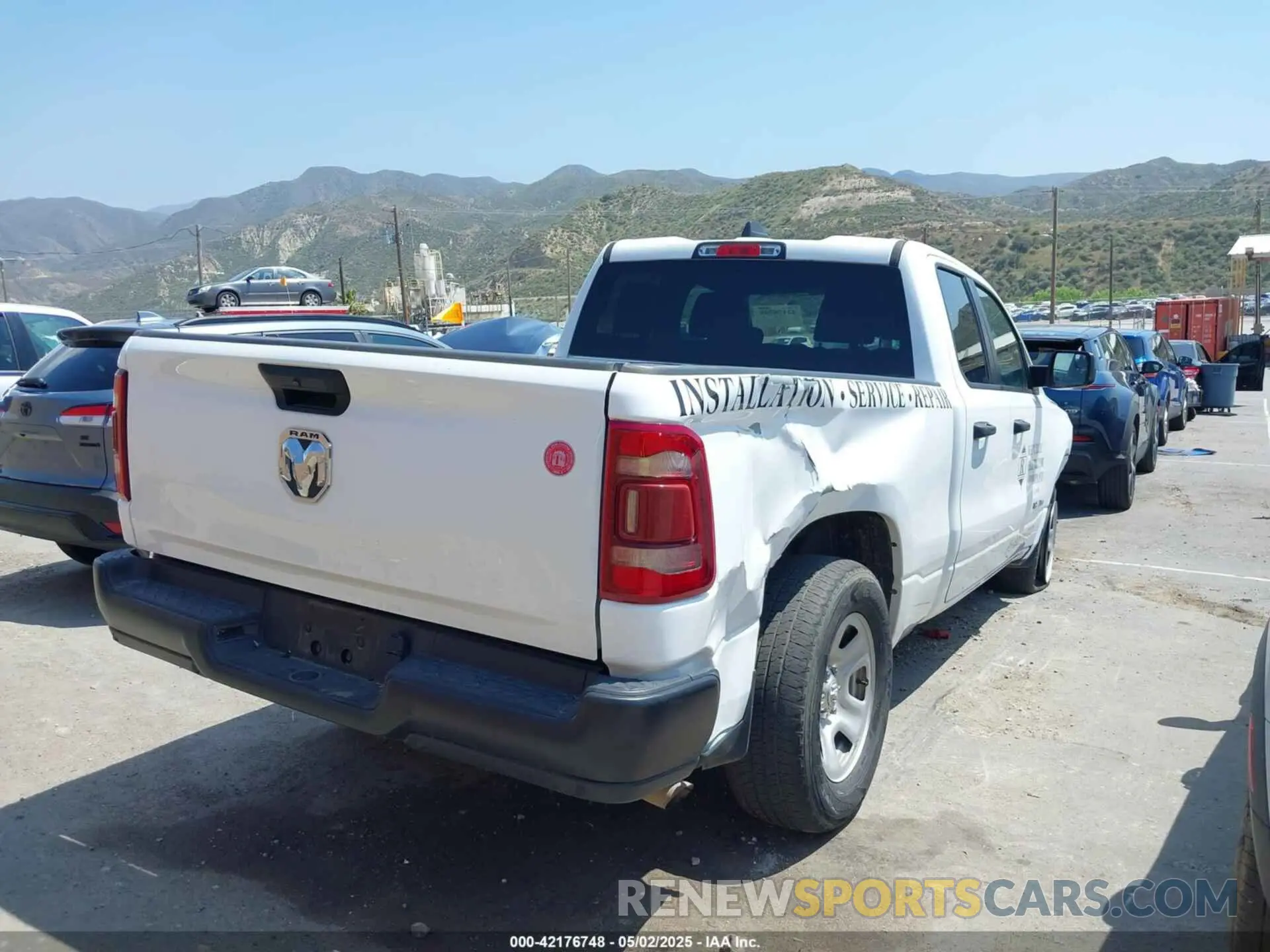 4 Photograph of a damaged car 1C6SRECG7NN435846 RAM 1500 2022