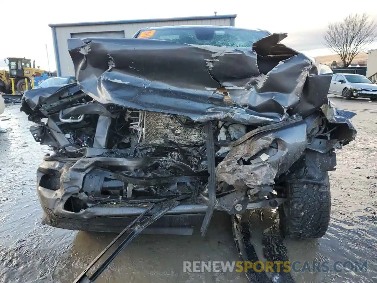 5 Photograph of a damaged car 1C6SRFBT0NN141502 RAM 1500 2022