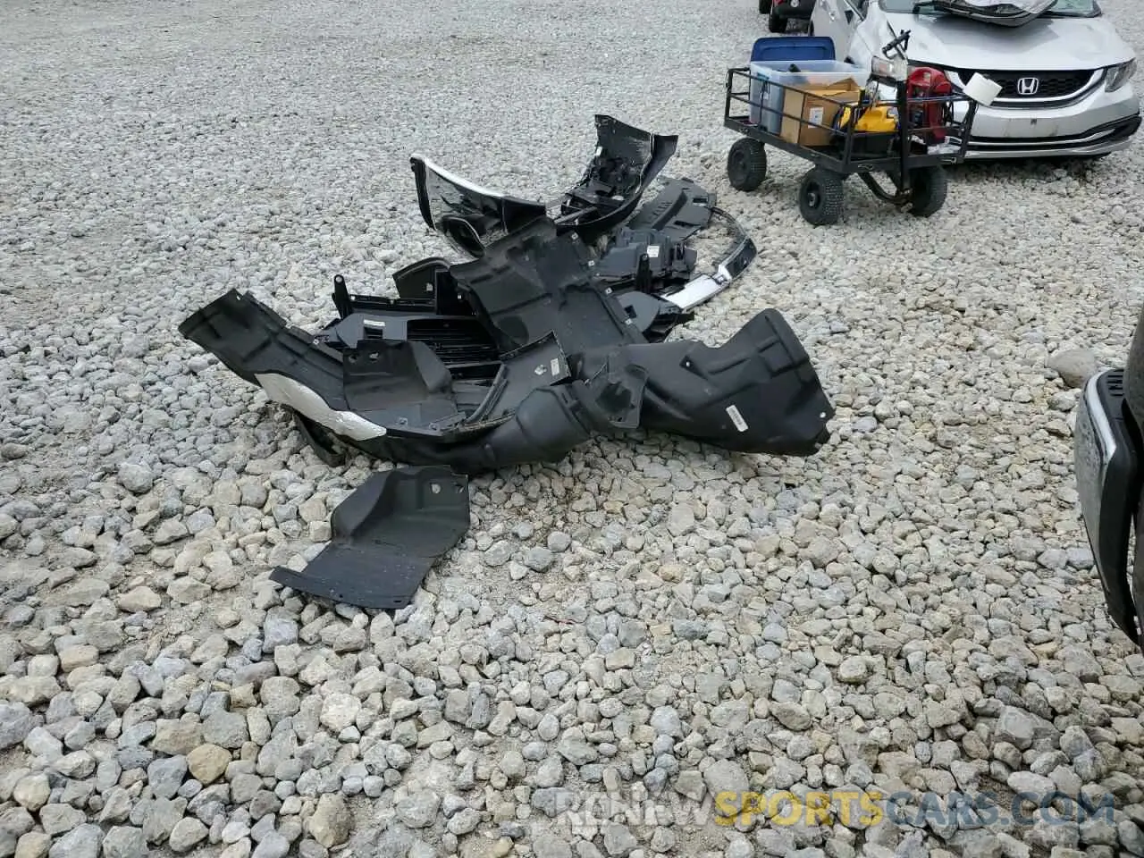 12 Photograph of a damaged car 1C6SRFBT1NN161404 RAM 1500 2022