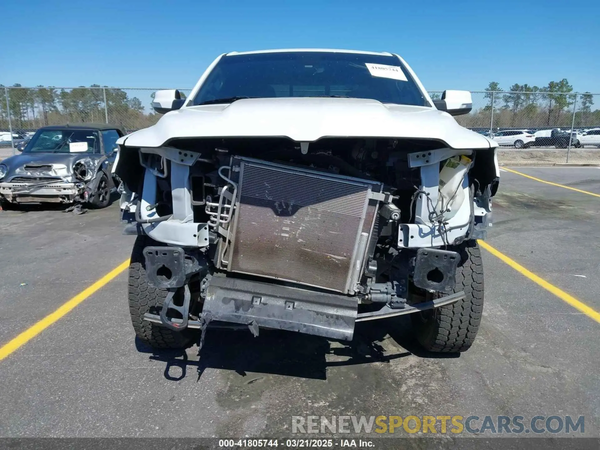 13 Photograph of a damaged car 1C6SRFBT1NN389824 RAM 1500 2022