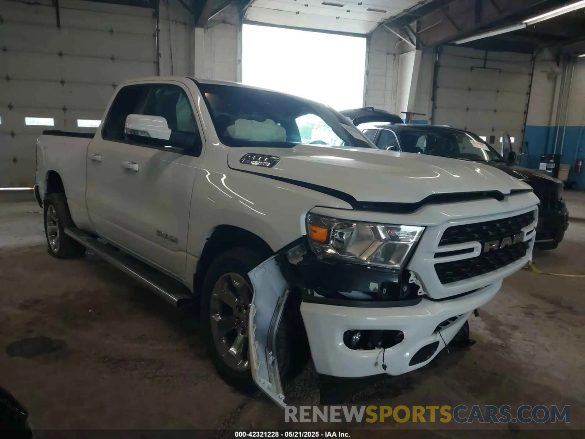 1 Photograph of a damaged car 1C6SRFBT2NN161749 RAM 1500 2022