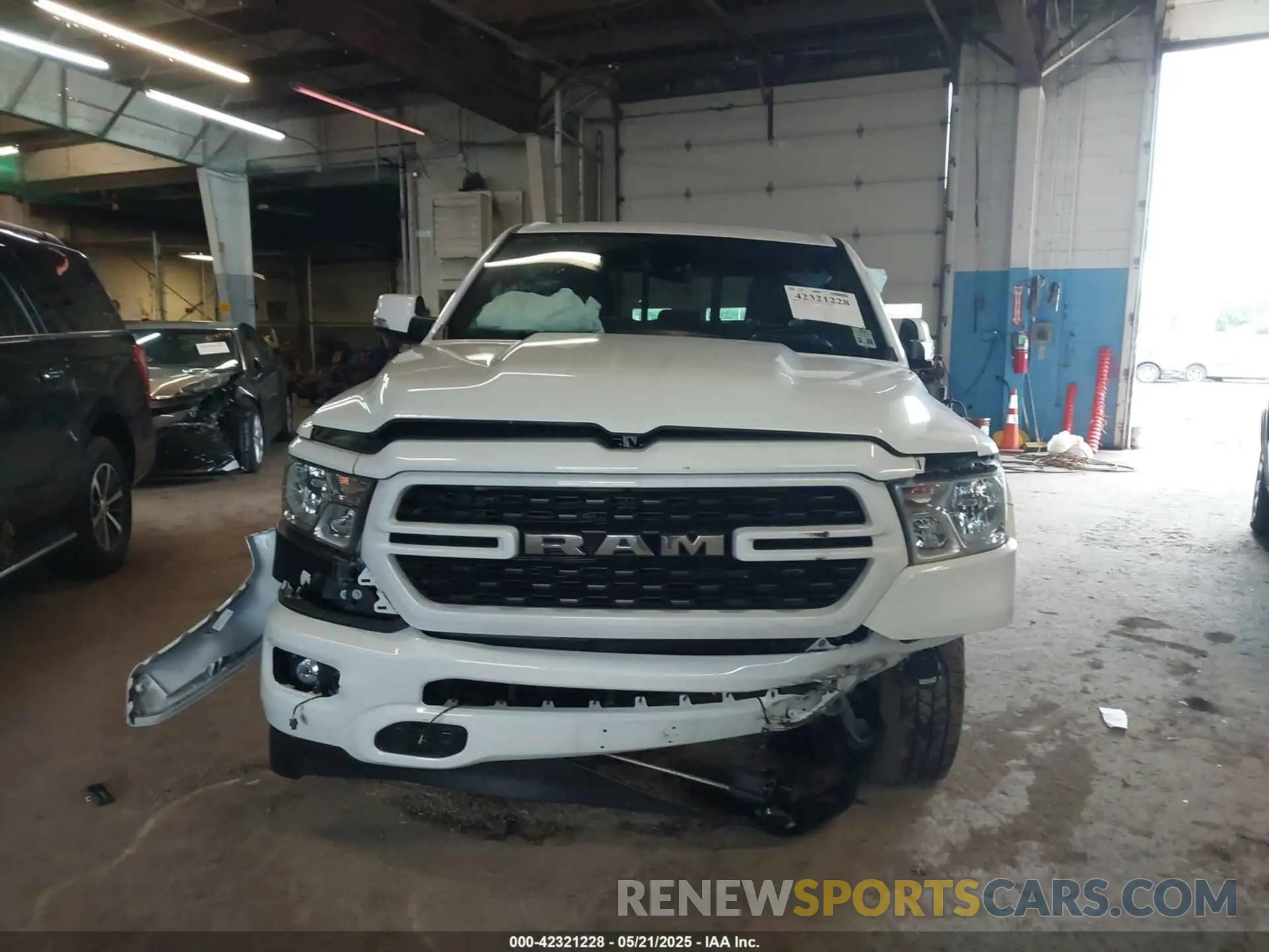 12 Photograph of a damaged car 1C6SRFBT2NN161749 RAM 1500 2022