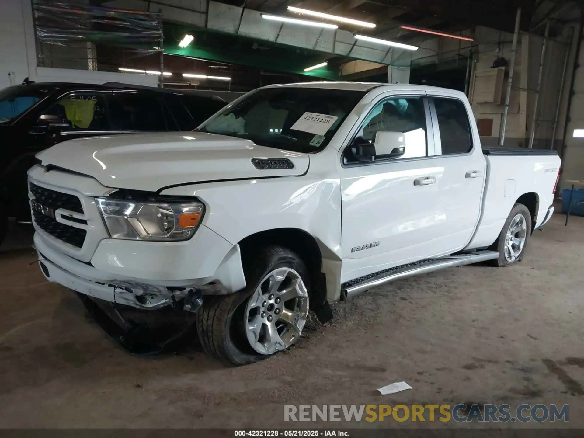 2 Photograph of a damaged car 1C6SRFBT2NN161749 RAM 1500 2022