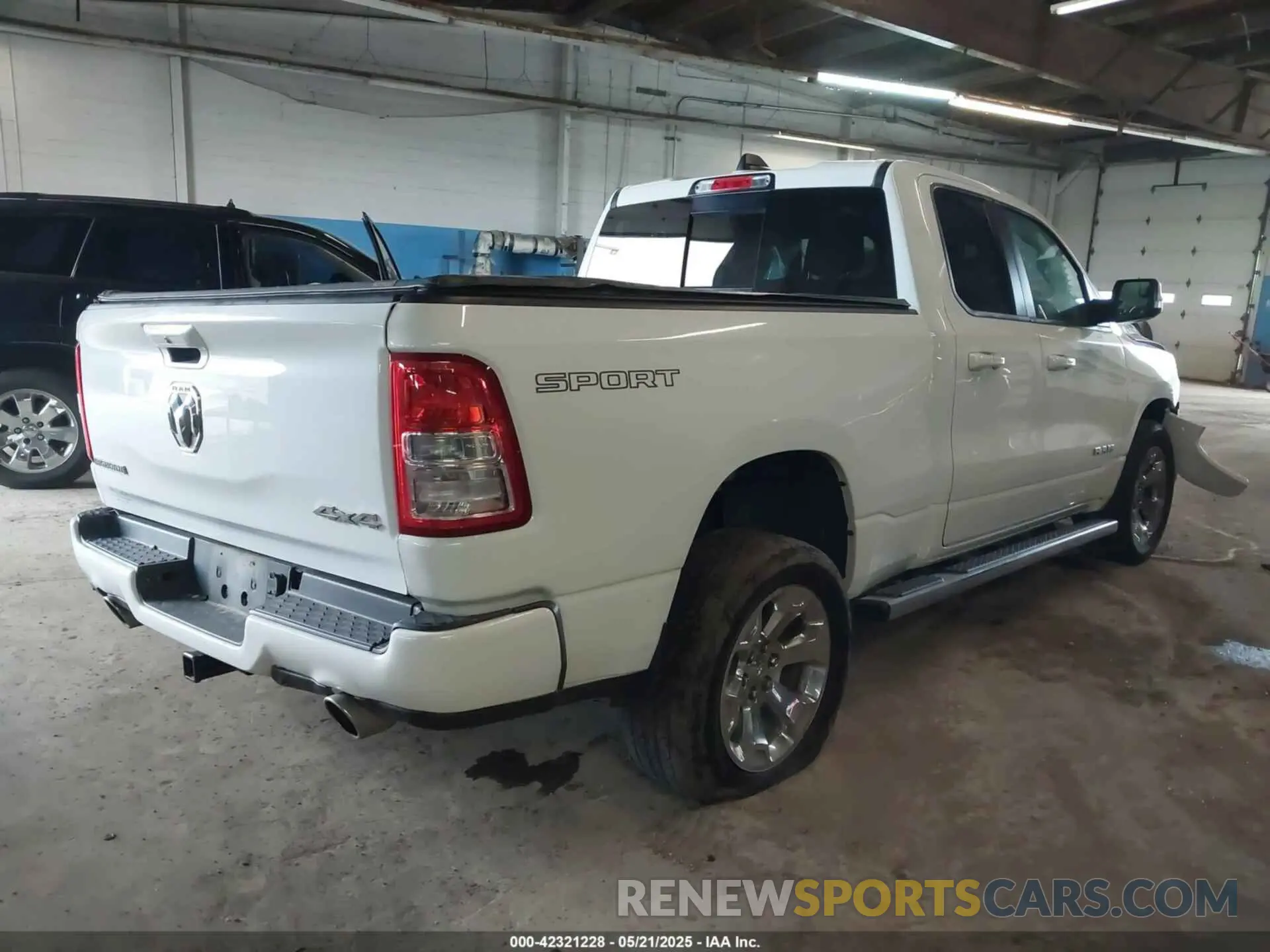 4 Photograph of a damaged car 1C6SRFBT2NN161749 RAM 1500 2022
