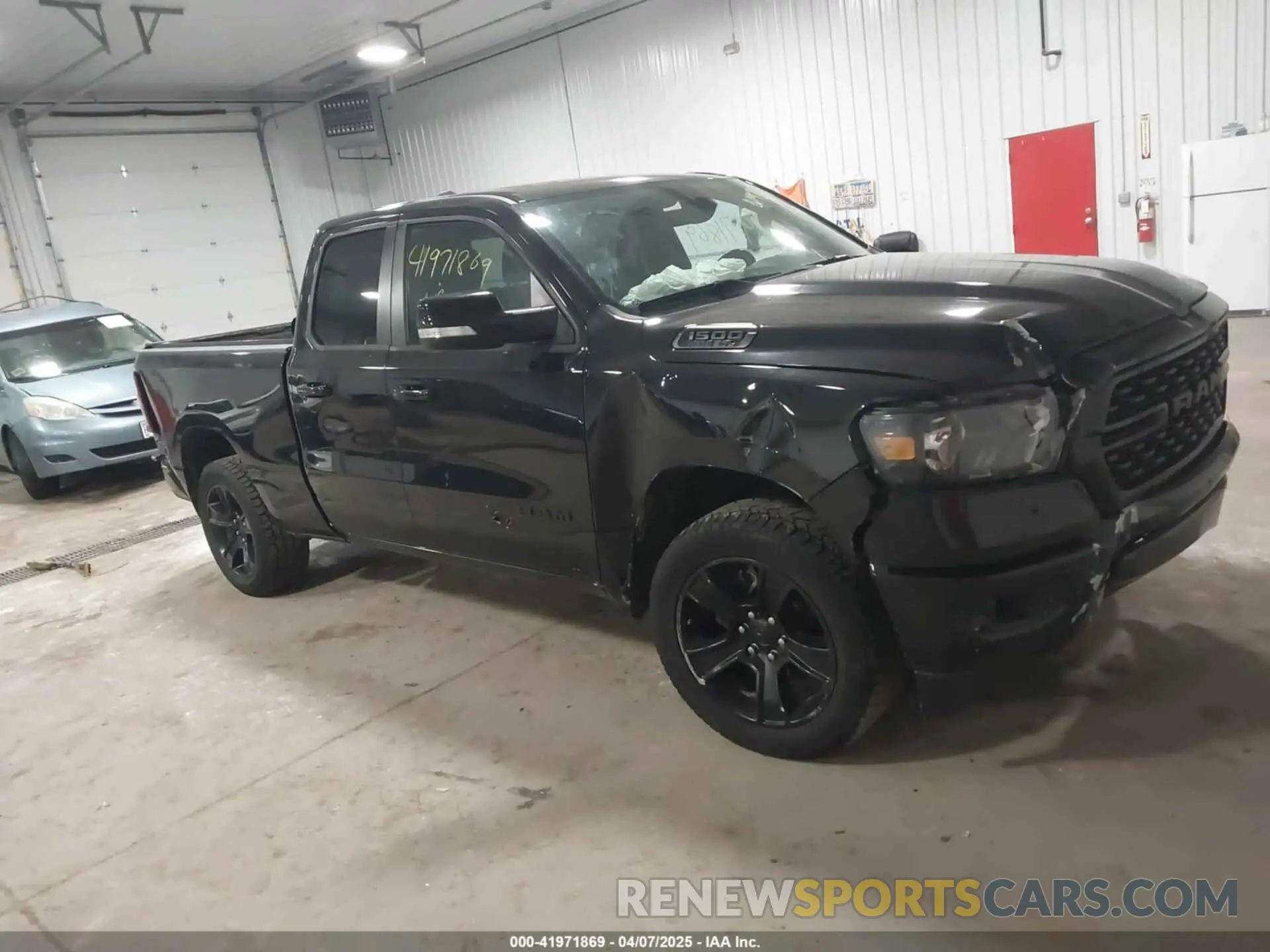 1 Photograph of a damaged car 1C6SRFBT2NN281888 RAM 1500 2022