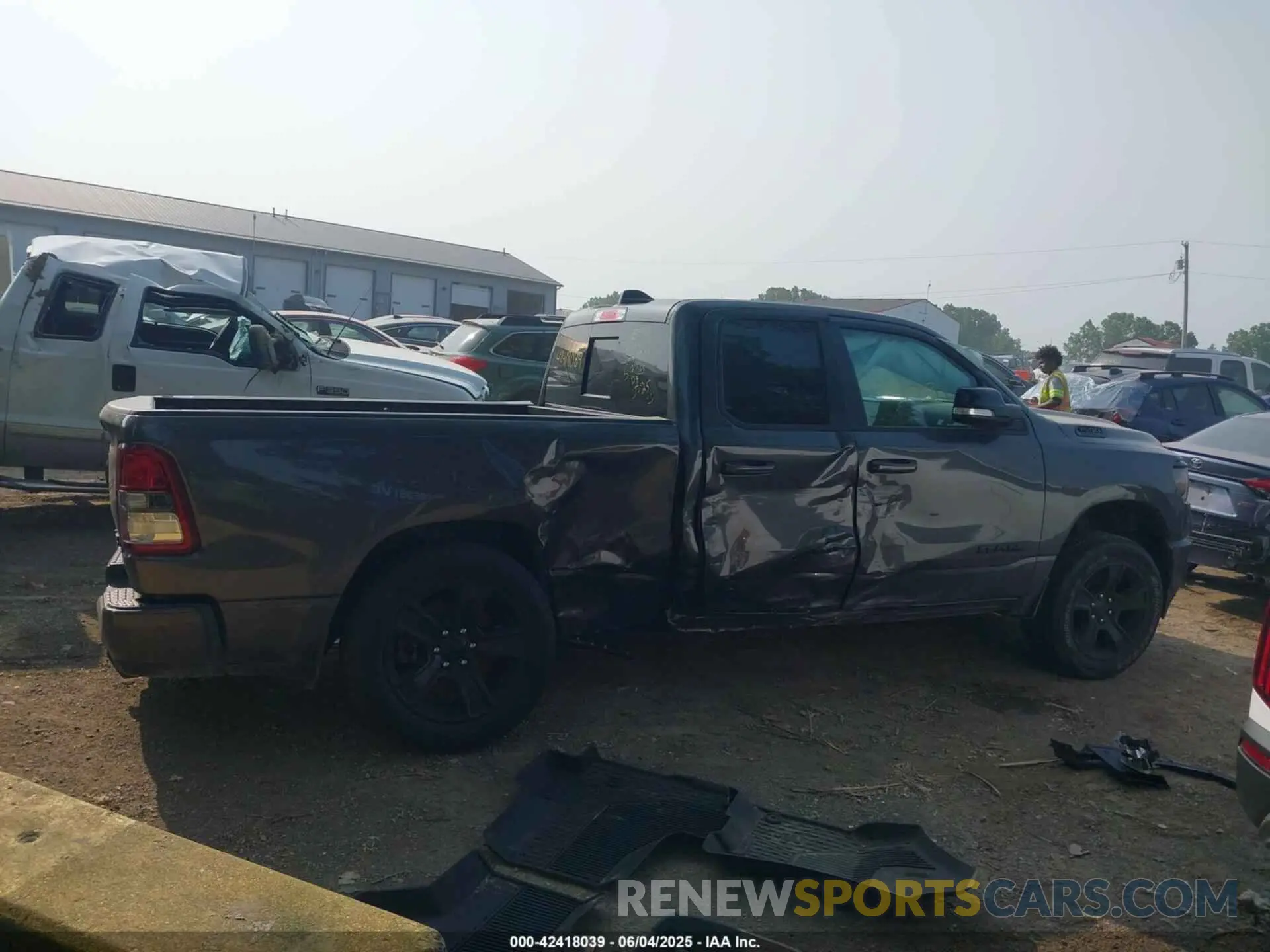 14 Photograph of a damaged car 1C6SRFBT3NN116559 RAM 1500 2022