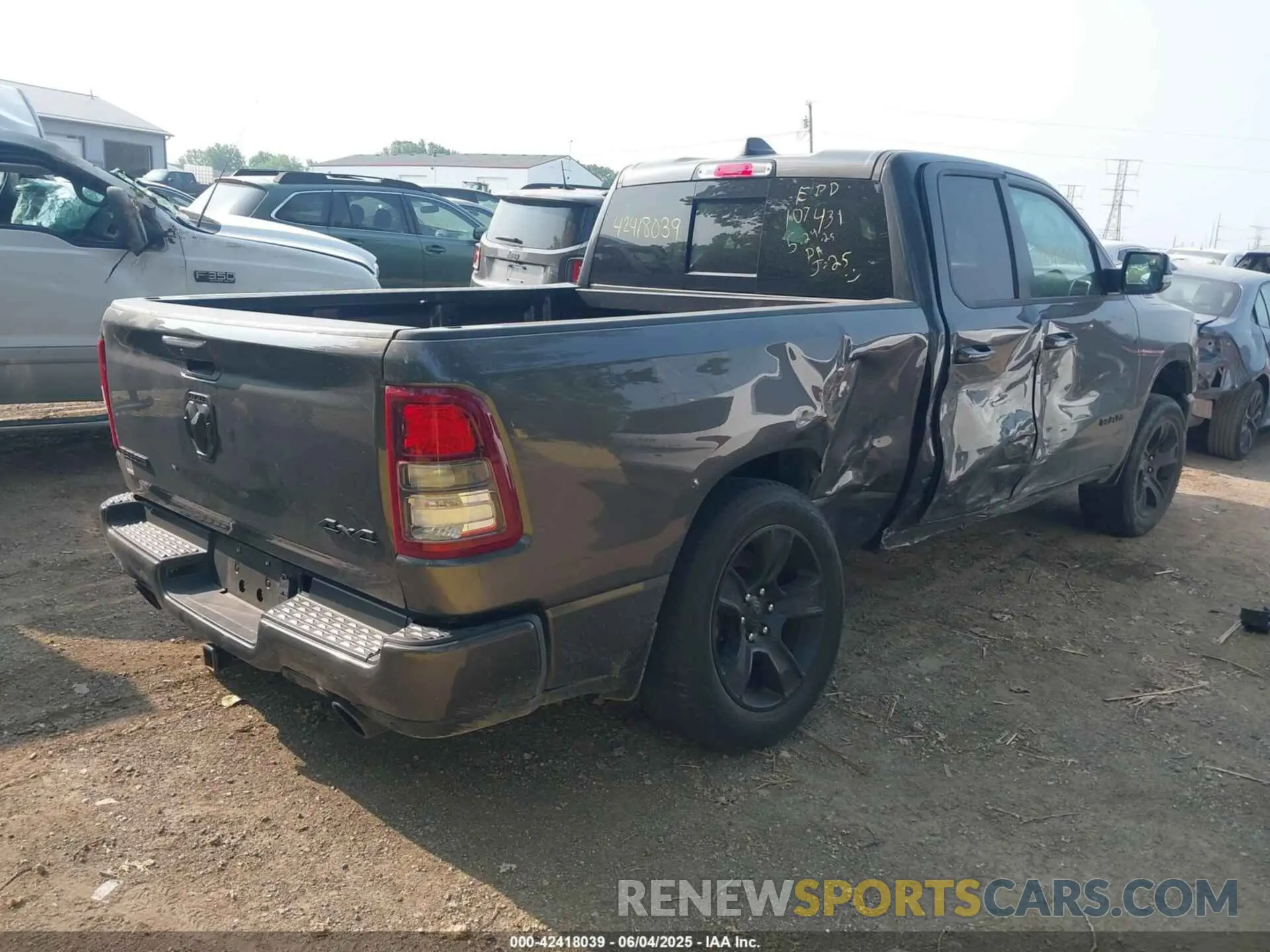4 Photograph of a damaged car 1C6SRFBT3NN116559 RAM 1500 2022
