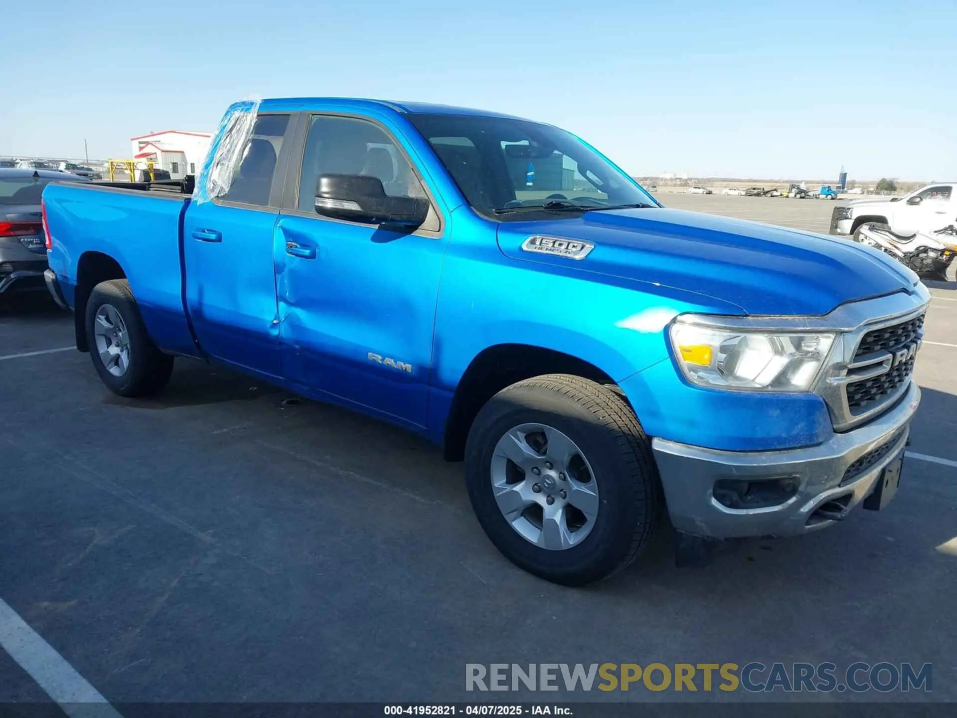 1 Photograph of a damaged car 1C6SRFBT3NN162845 RAM 1500 2022
