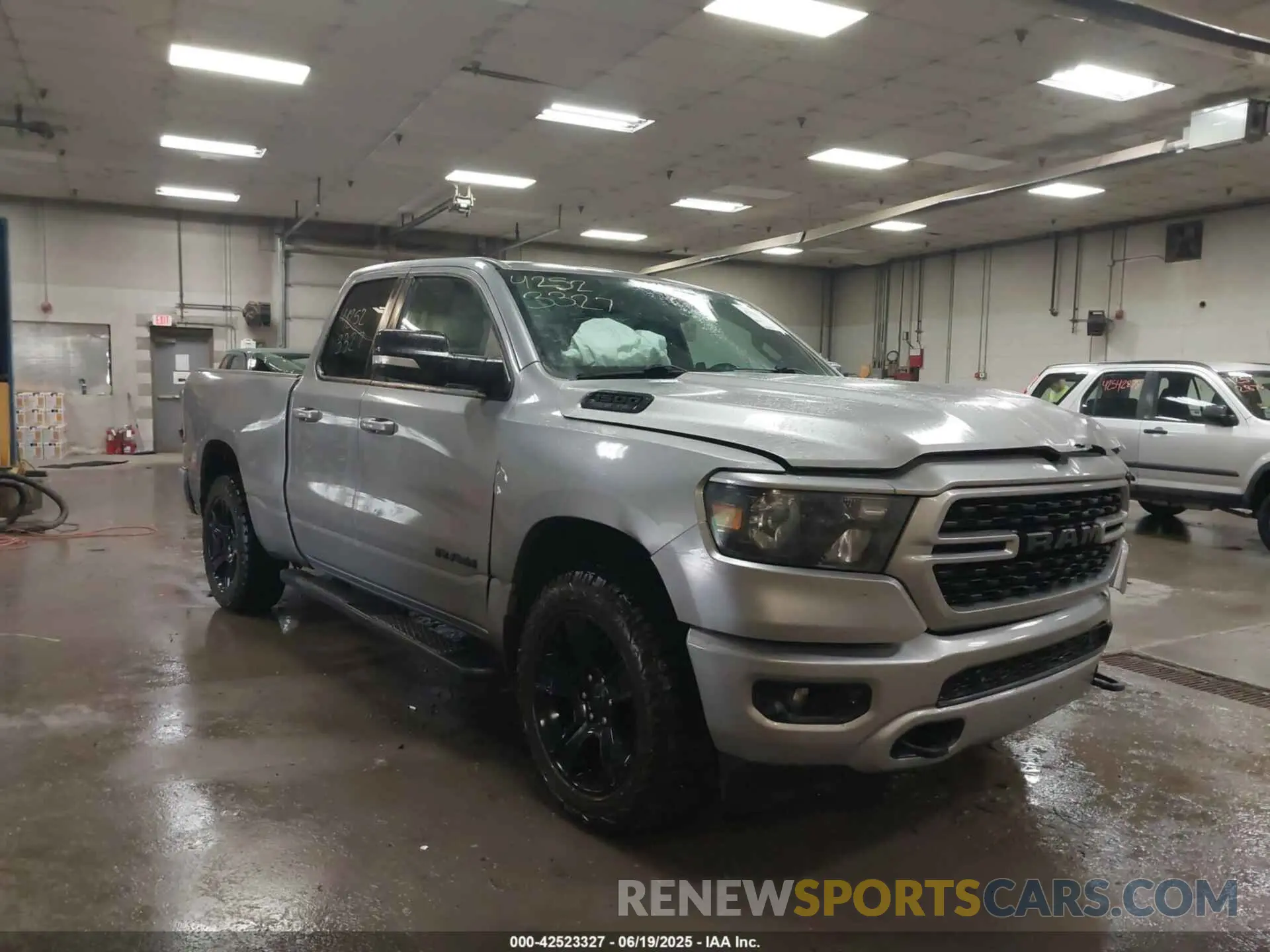 1 Photograph of a damaged car 1C6SRFBT4NN164801 RAM 1500 2022