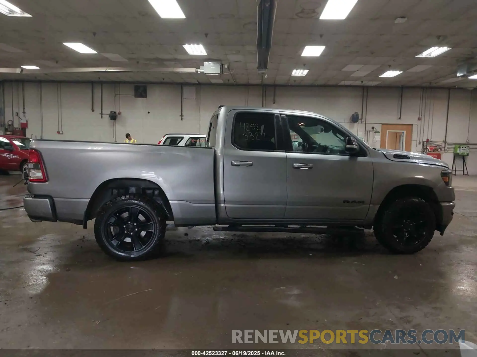 13 Photograph of a damaged car 1C6SRFBT4NN164801 RAM 1500 2022