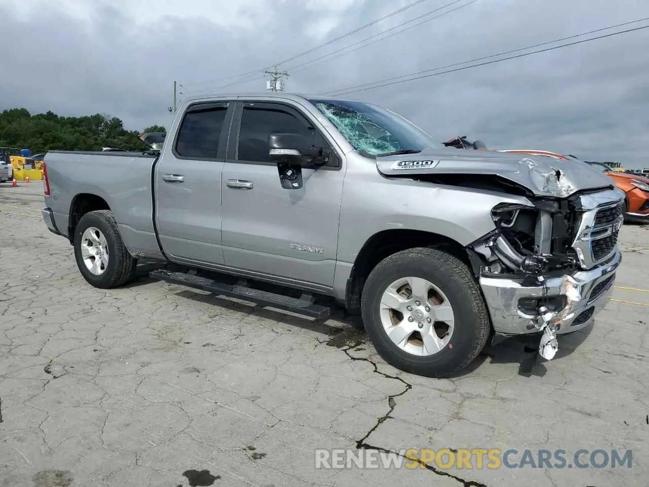 4 Photograph of a damaged car 1C6SRFBT4NN327673 RAM 1500 2022