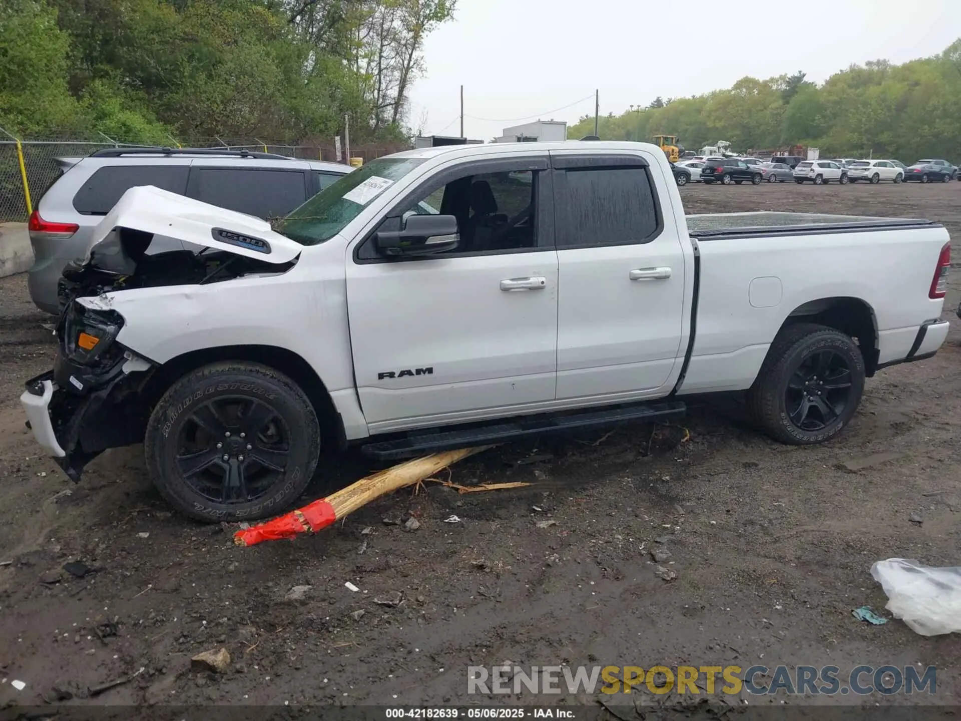 14 Photograph of a damaged car 1C6SRFBT4NN445190 RAM 1500 2022