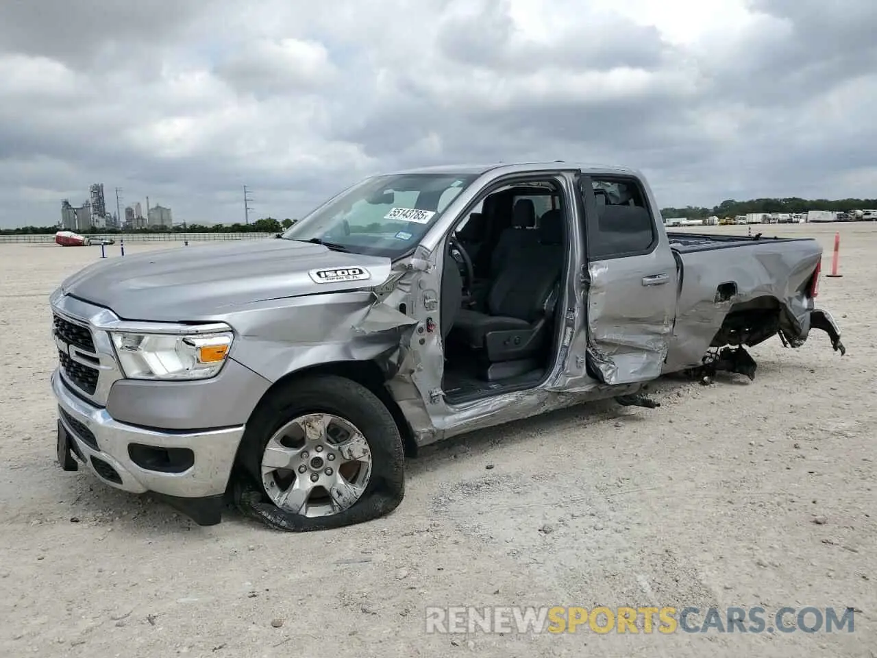 1 Photograph of a damaged car 1C6SRFBT6NN135557 RAM 1500 2022