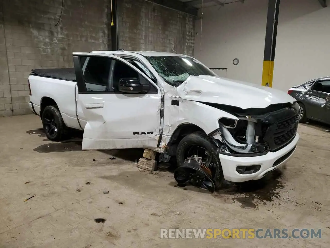 4 Photograph of a damaged car 1C6SRFBT6NN360108 RAM 1500 2022