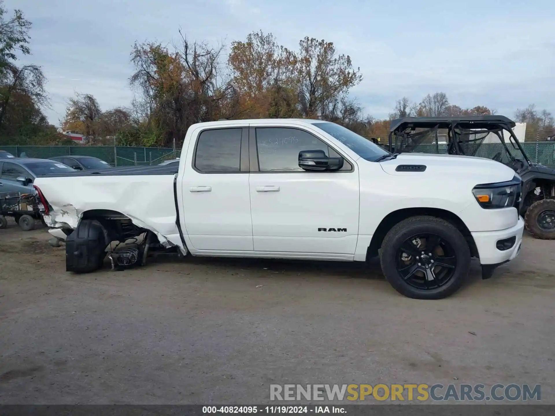 13 Photograph of a damaged car 1C6SRFBT7NN375197 RAM 1500 2022