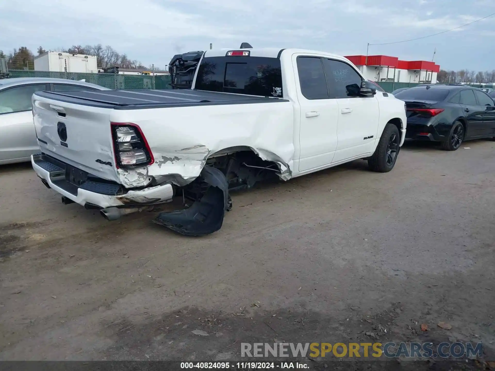 4 Photograph of a damaged car 1C6SRFBT7NN375197 RAM 1500 2022