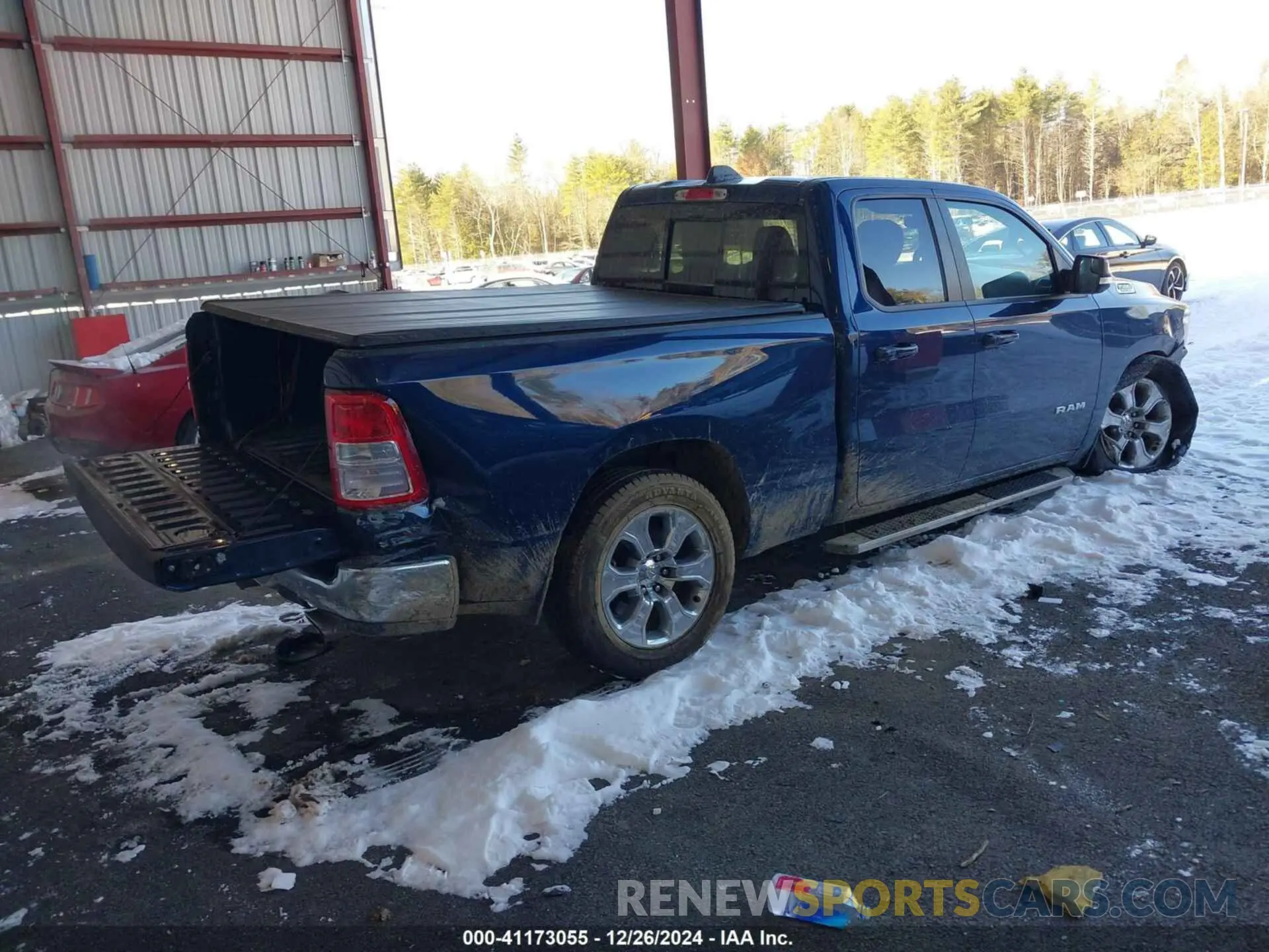 4 Photograph of a damaged car 1C6SRFBT8NN235367 RAM 1500 2022