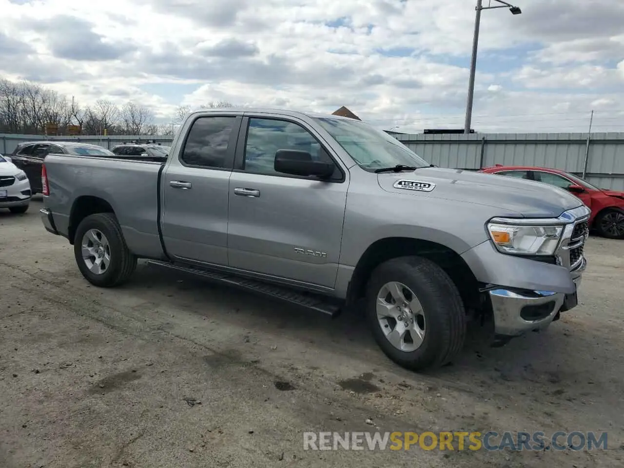 4 Photograph of a damaged car 1C6SRFBT8NN362457 RAM 1500 2022