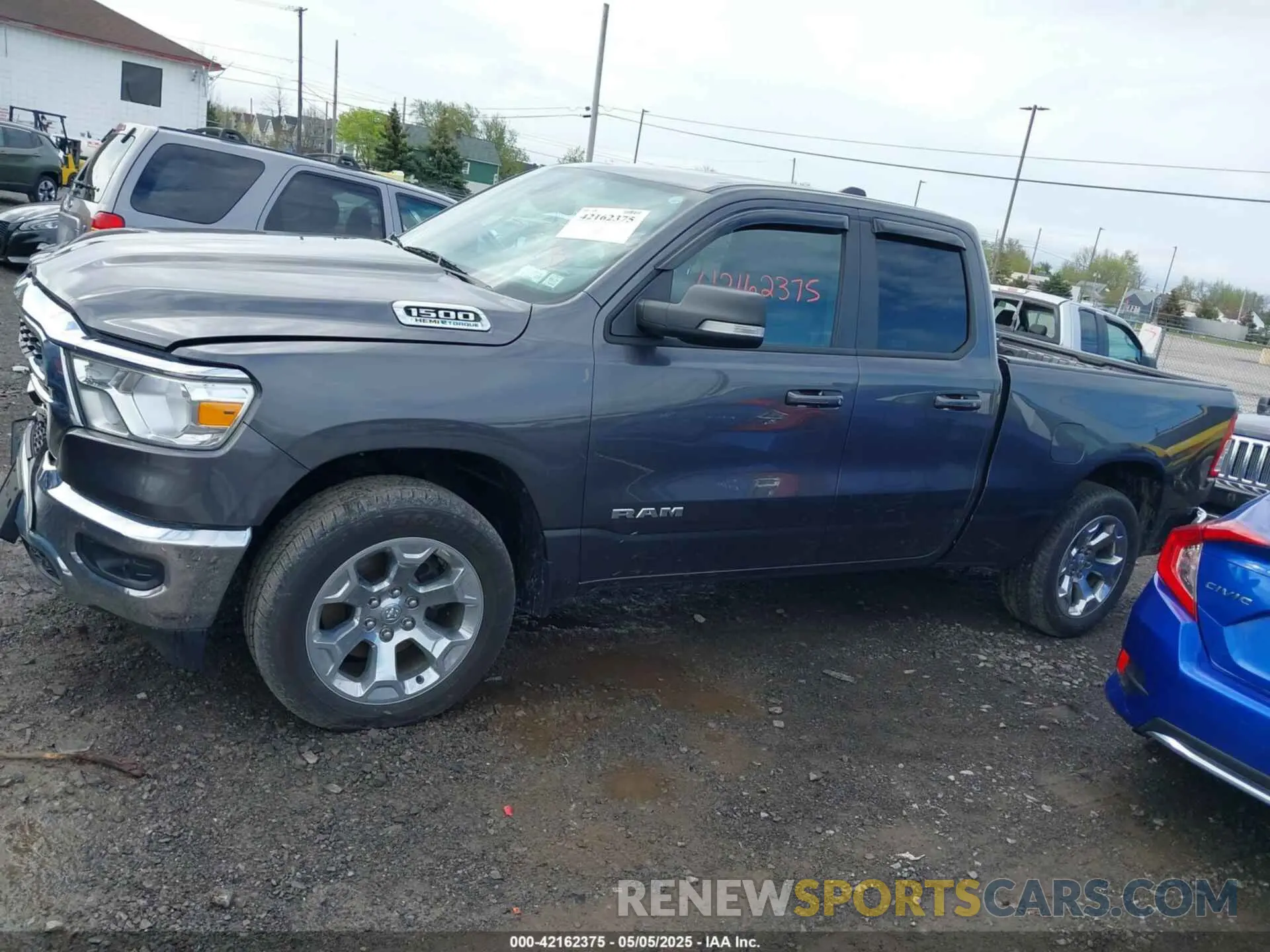 14 Photograph of a damaged car 1C6SRFBT8NN445547 RAM 1500 2022