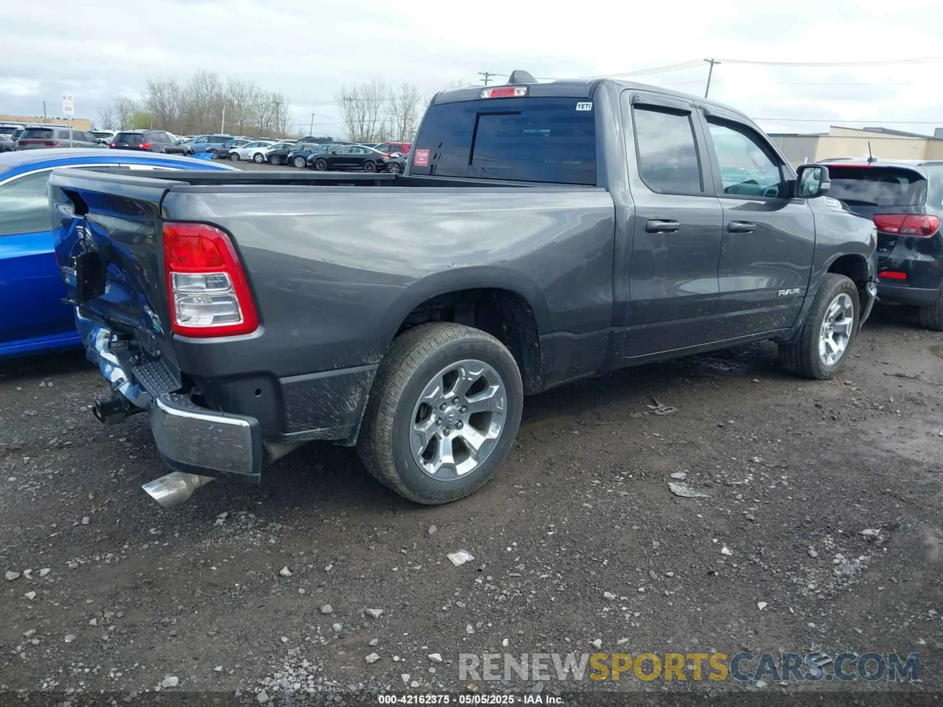 4 Photograph of a damaged car 1C6SRFBT8NN445547 RAM 1500 2022