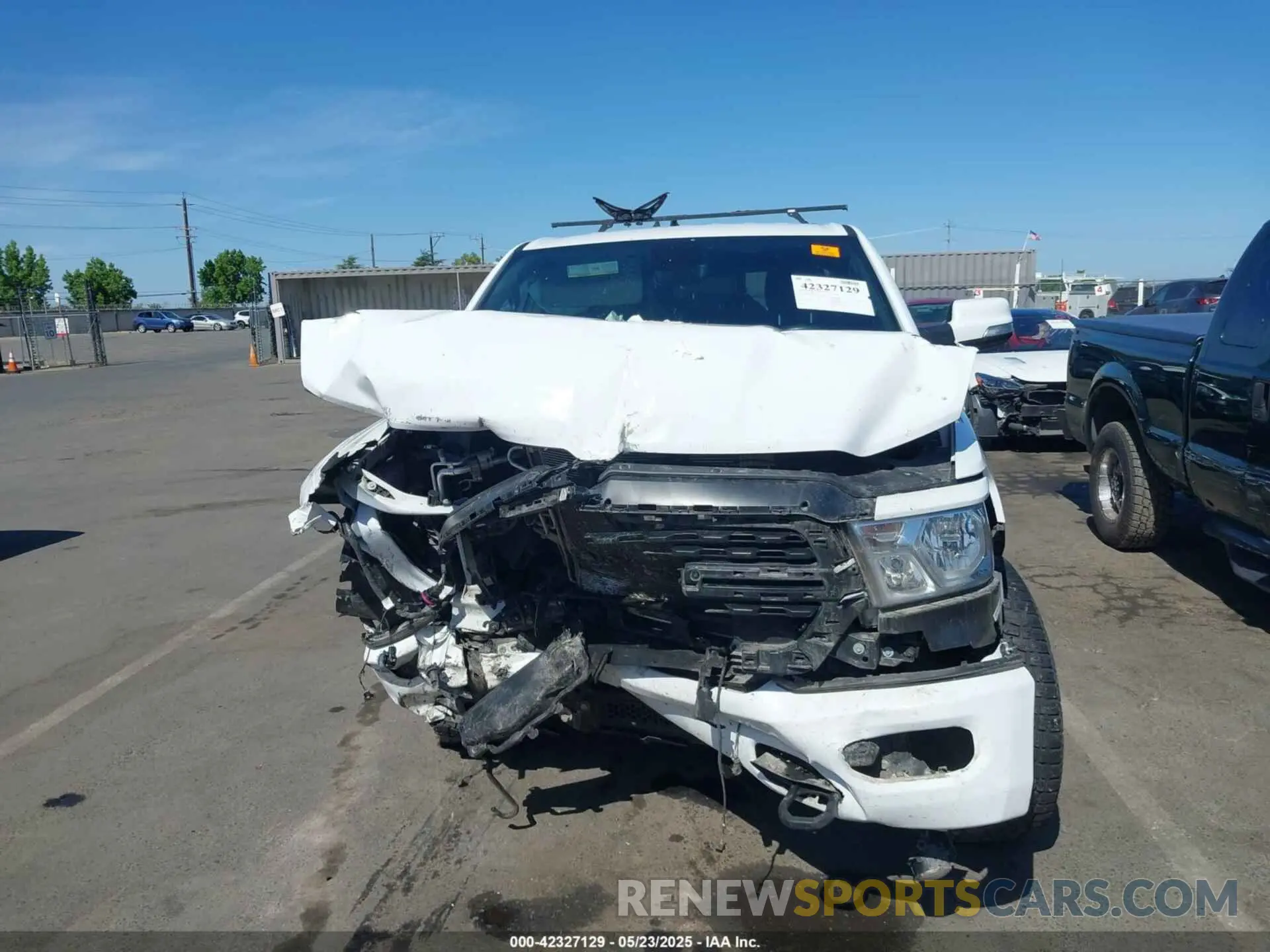 11 Photograph of a damaged car 1C6SRFBT9NN397346 RAM 1500 2022