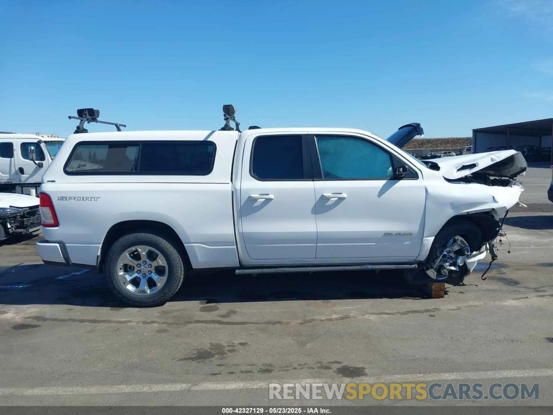 12 Photograph of a damaged car 1C6SRFBT9NN397346 RAM 1500 2022