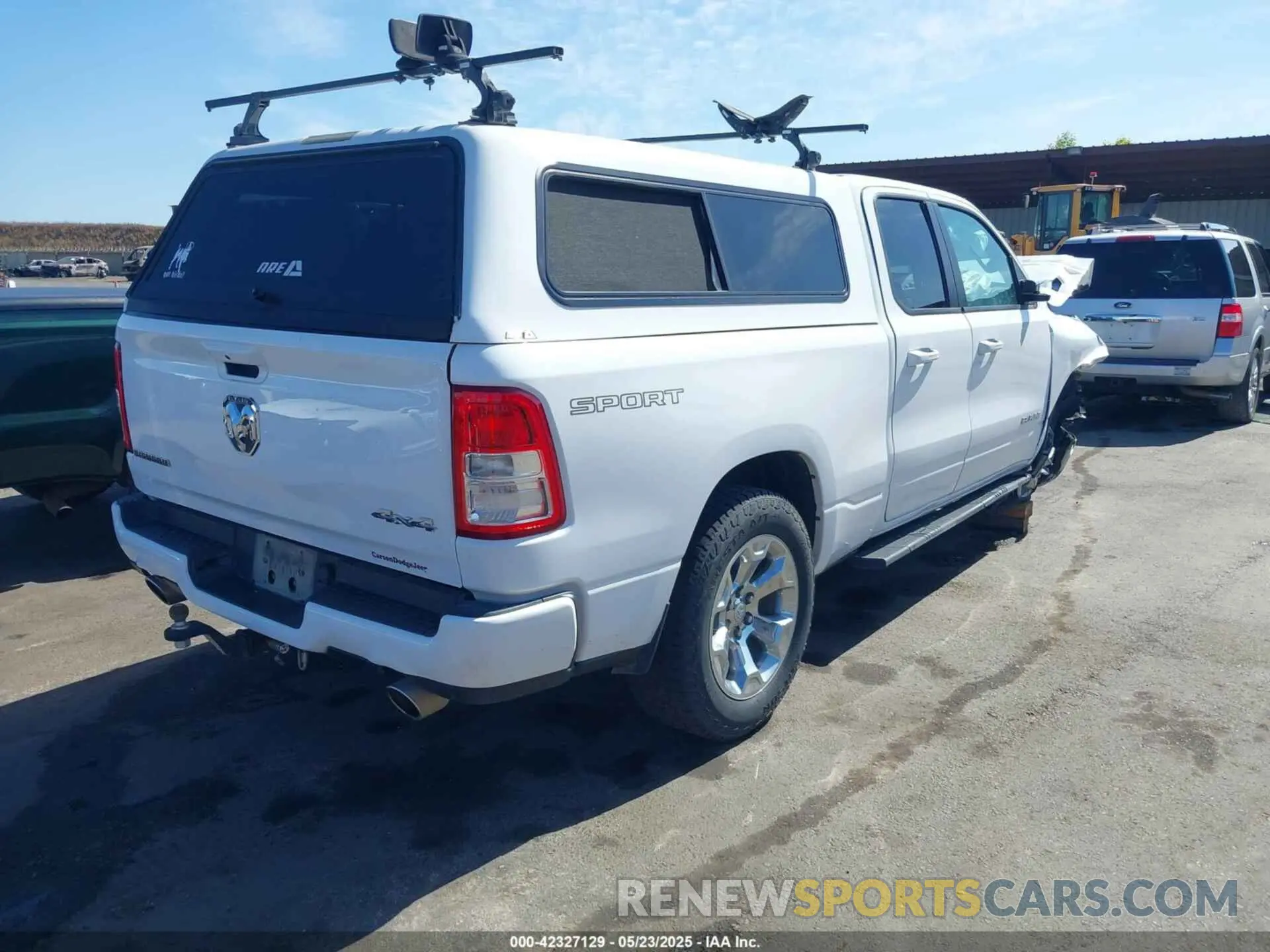 4 Photograph of a damaged car 1C6SRFBT9NN397346 RAM 1500 2022