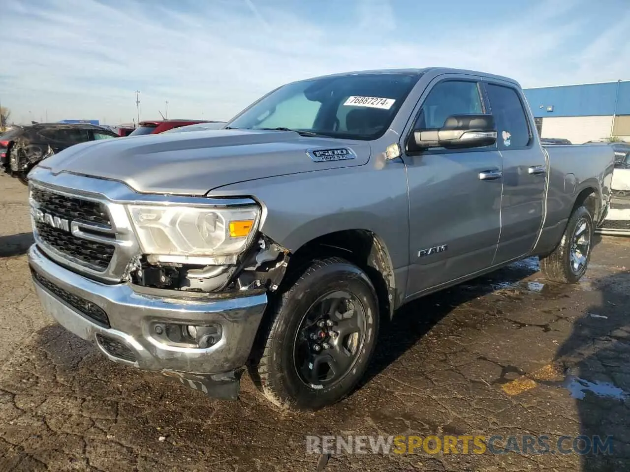 1 Photograph of a damaged car 1C6SRFBTXNN134542 RAM 1500 2022