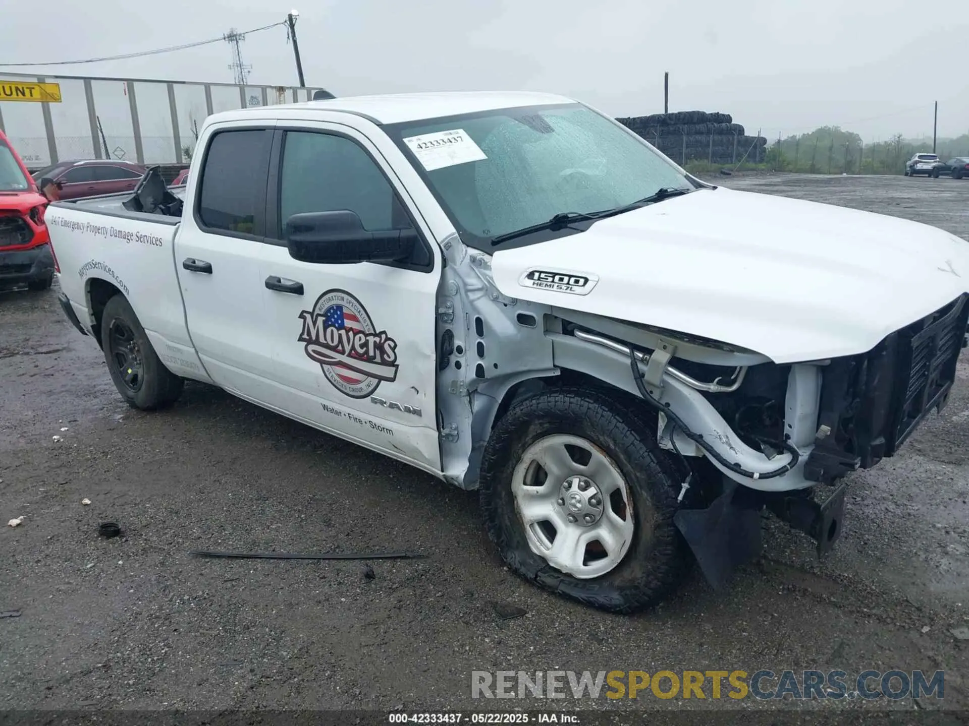 1 Photograph of a damaged car 1C6SRFCT2NN213959 RAM 1500 2022