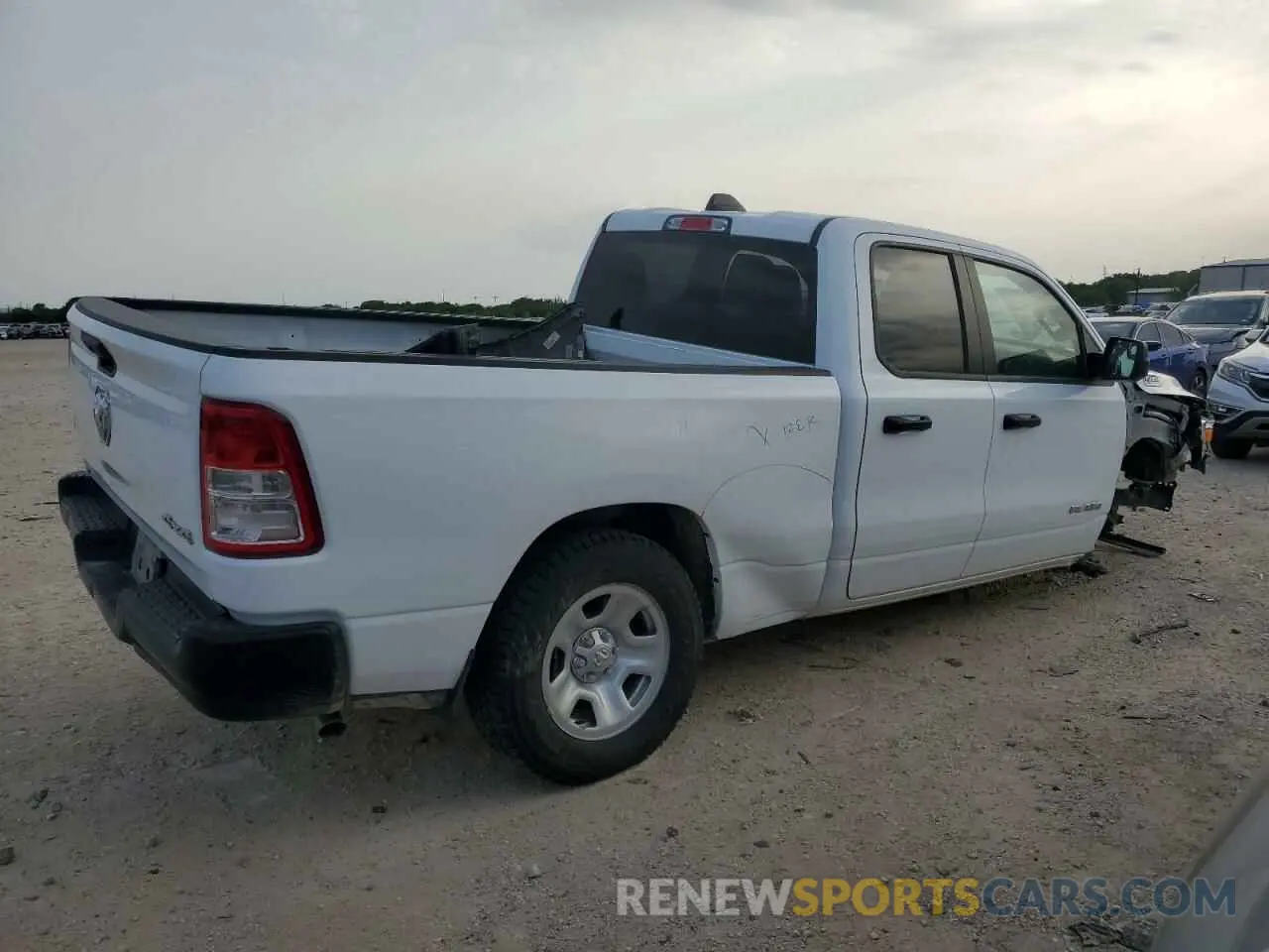3 Photograph of a damaged car 1C6SRFCT5NN283410 RAM 1500 2022