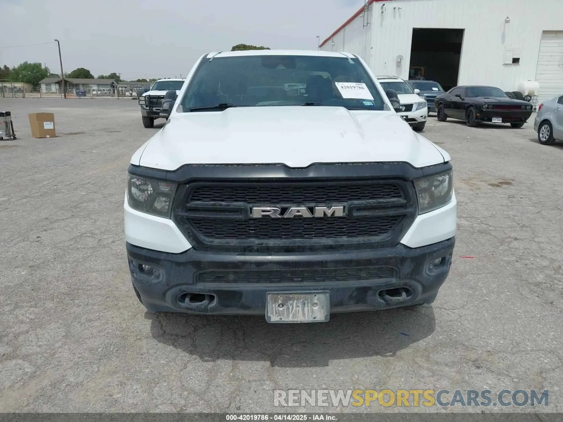 12 Photograph of a damaged car 1C6SRFCT5NN433600 RAM 1500 2022