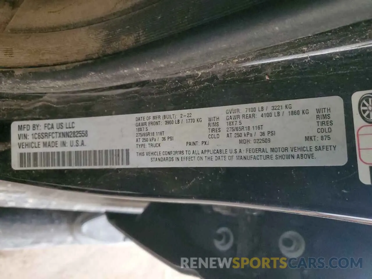 13 Photograph of a damaged car 1C6SRFCTXNN282558 RAM 1500 2022