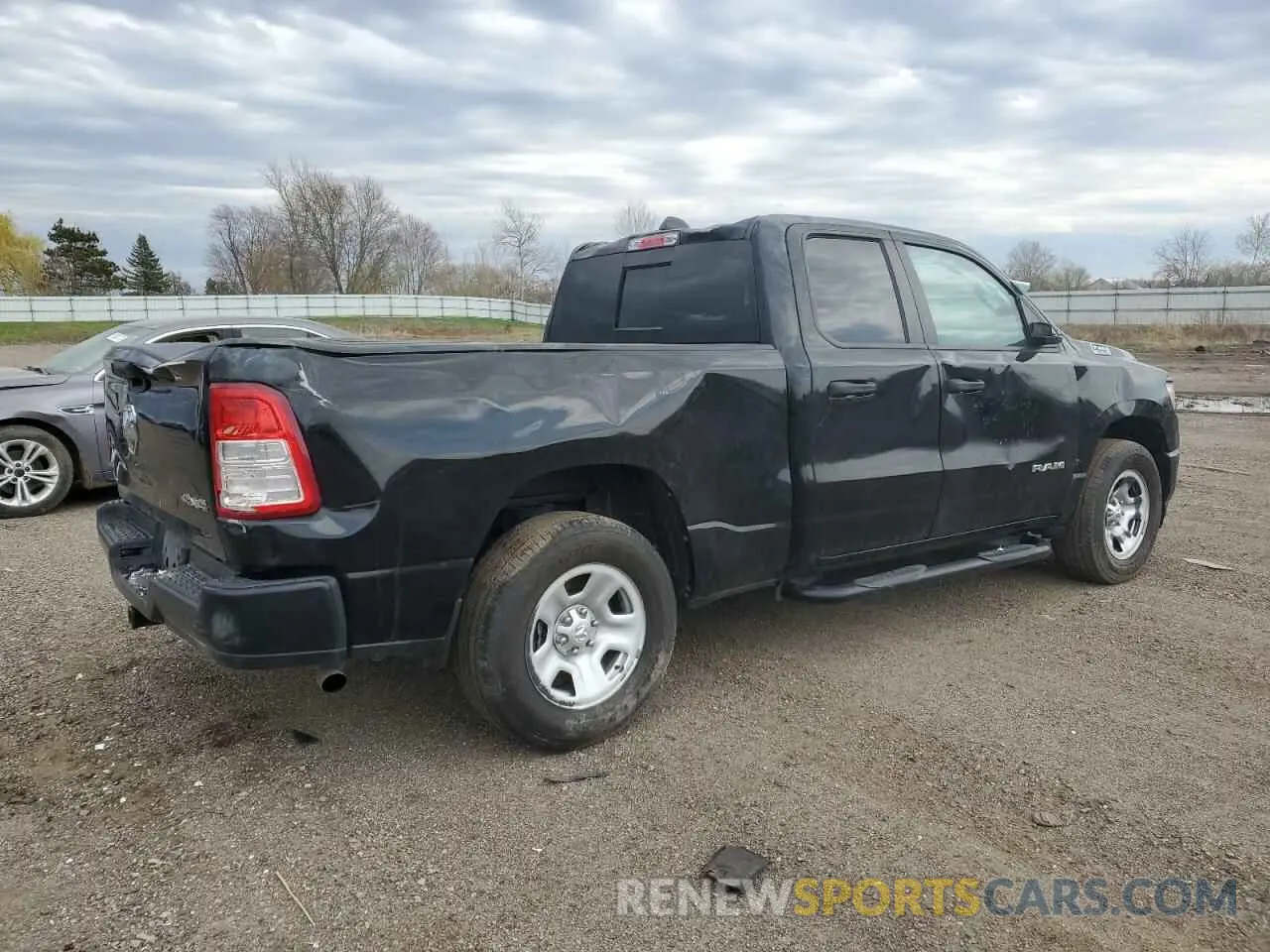 3 Photograph of a damaged car 1C6SRFCTXNN282558 RAM 1500 2022