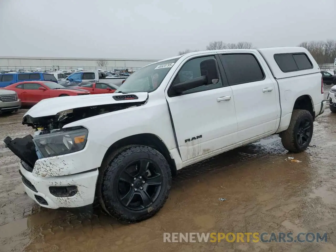 1 Photograph of a damaged car 1C6SRFFM7NN375140 RAM 1500 2022