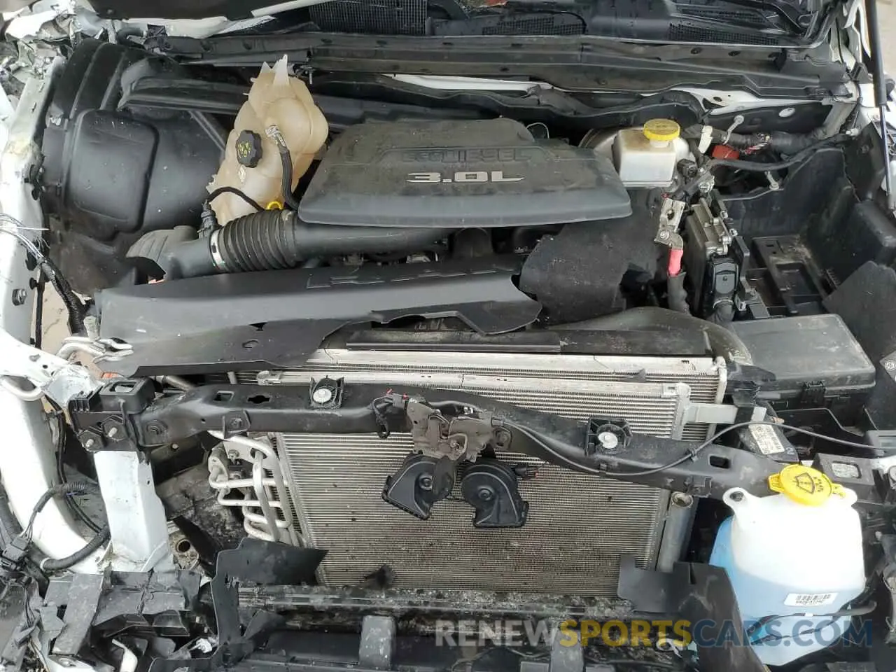 13 Photograph of a damaged car 1C6SRFFM7NN375140 RAM 1500 2022