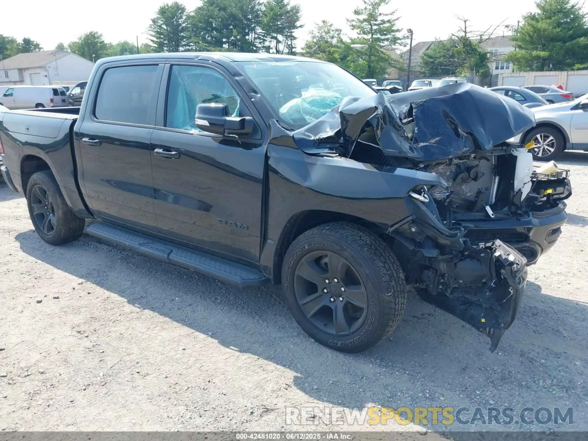1 Photograph of a damaged car 1C6SRFFT0NN119106 RAM 1500 2022