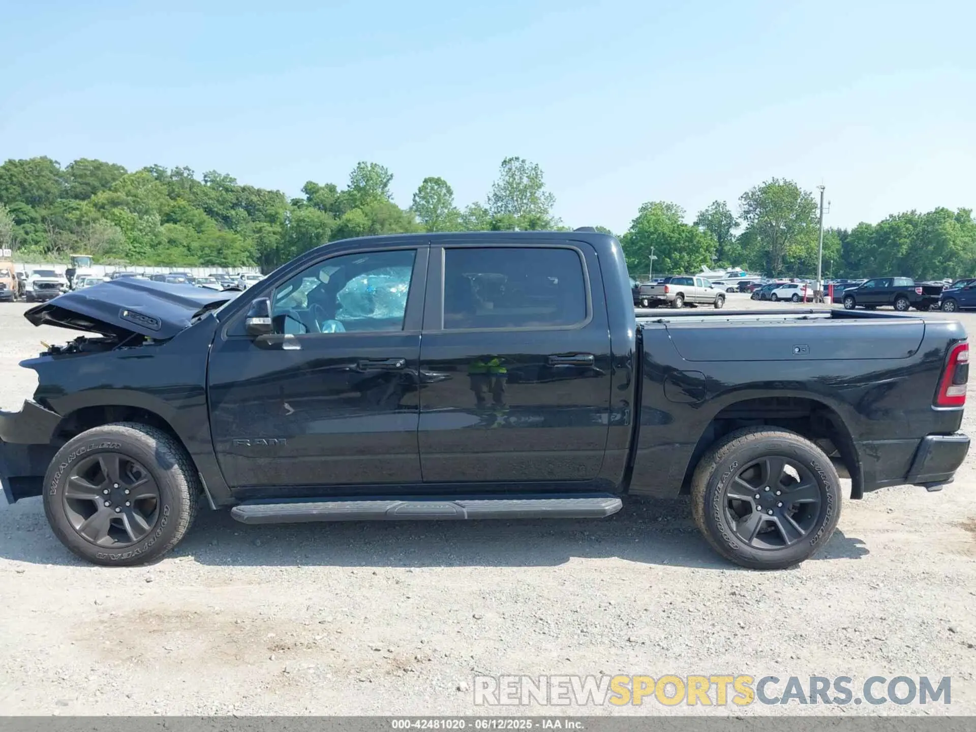 14 Photograph of a damaged car 1C6SRFFT0NN119106 RAM 1500 2022