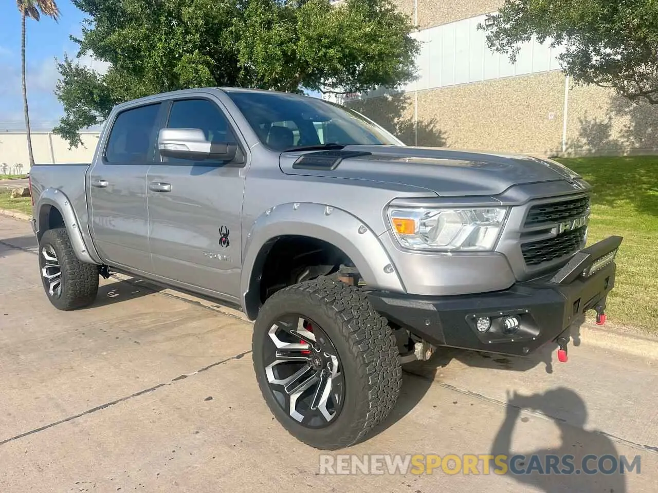 1 Photograph of a damaged car 1C6SRFFT0NN135872 RAM 1500 2022