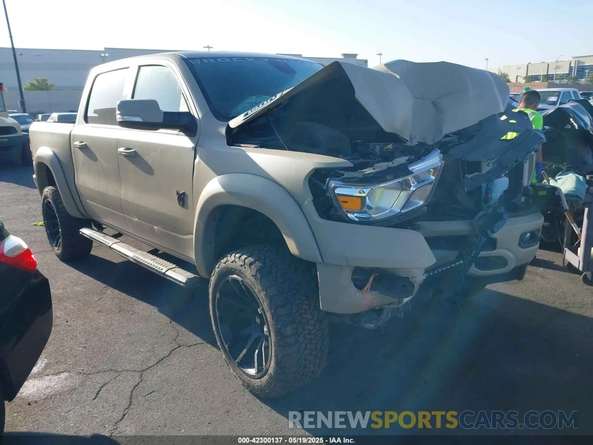 1 Photograph of a damaged car 1C6SRFFT0NN311092 RAM 1500 2022