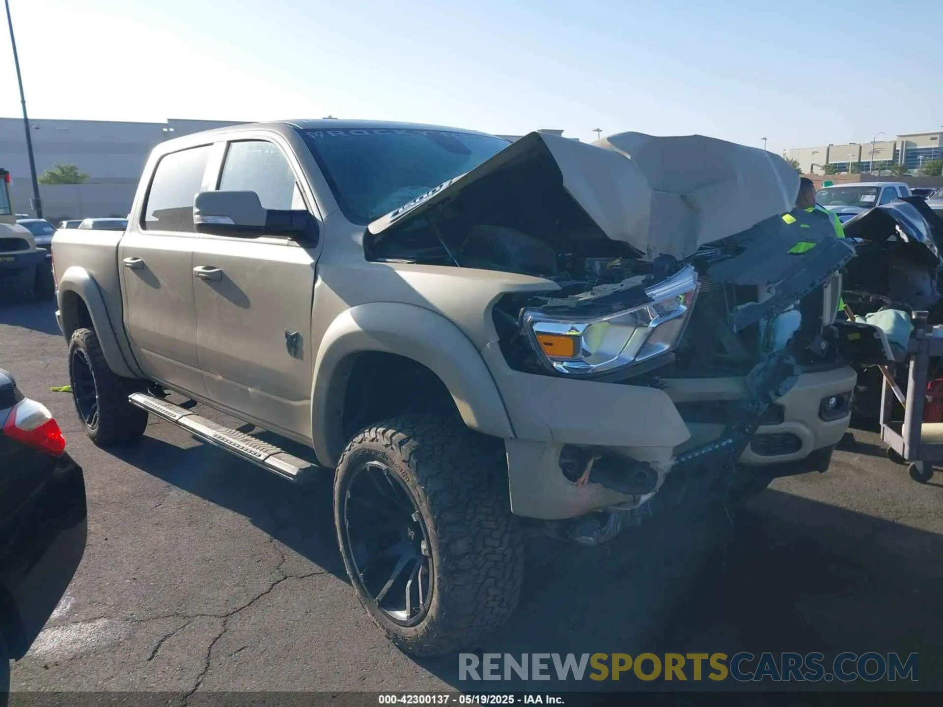 14 Photograph of a damaged car 1C6SRFFT0NN311092 RAM 1500 2022