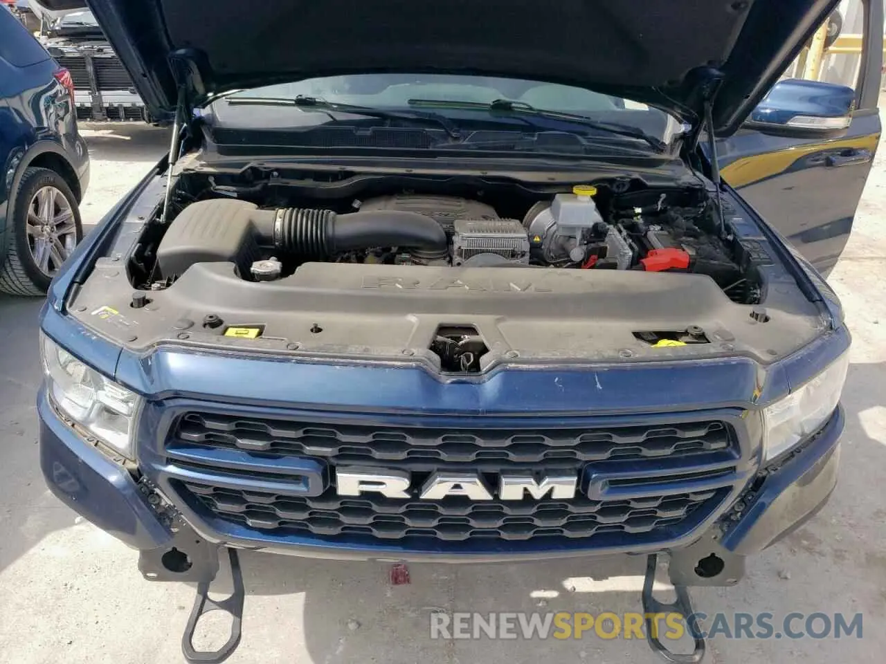 11 Photograph of a damaged car 1C6SRFFT0NN379571 RAM 1500 2022