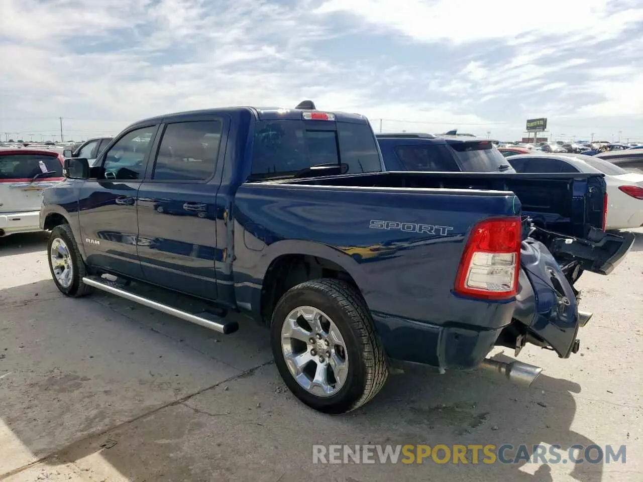 2 Photograph of a damaged car 1C6SRFFT0NN379571 RAM 1500 2022