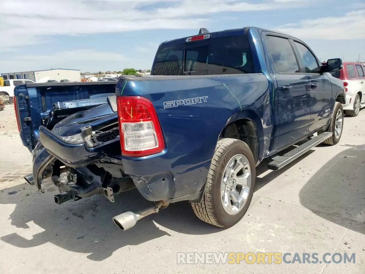 3 Photograph of a damaged car 1C6SRFFT0NN379571 RAM 1500 2022