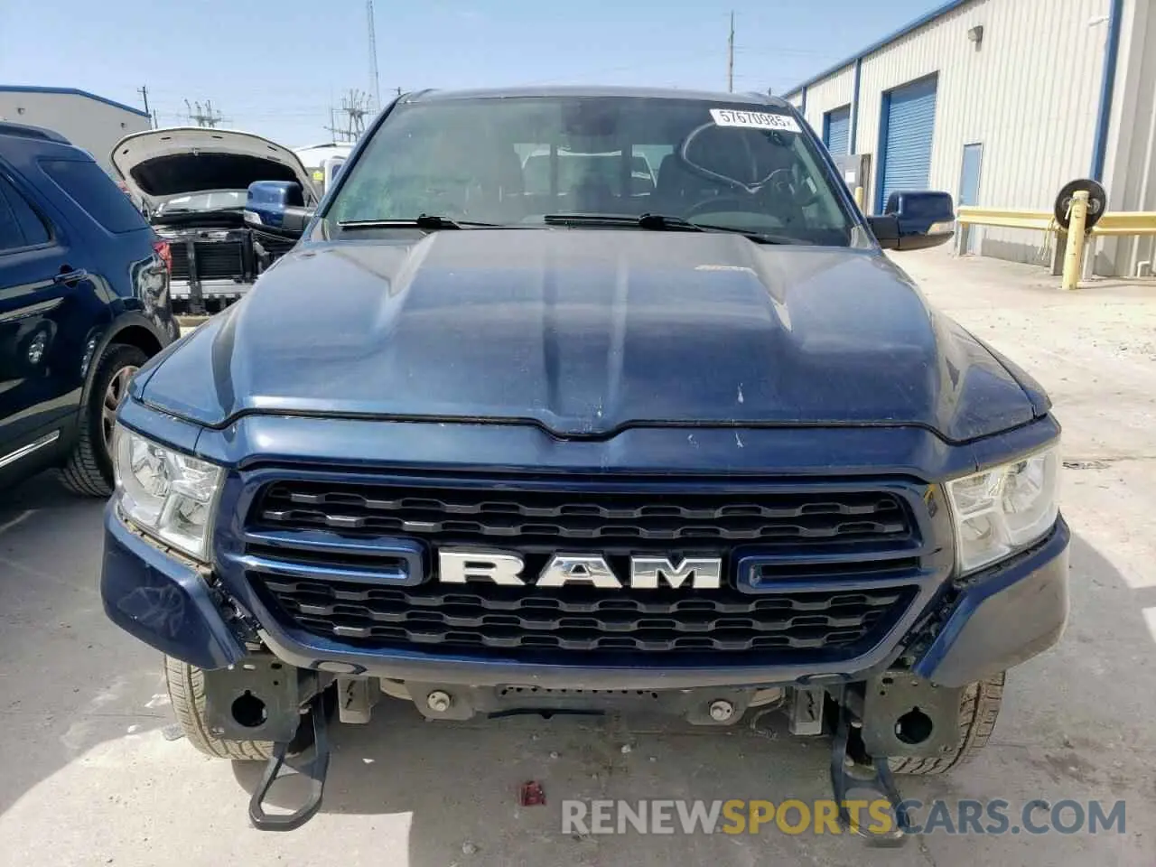 5 Photograph of a damaged car 1C6SRFFT0NN379571 RAM 1500 2022