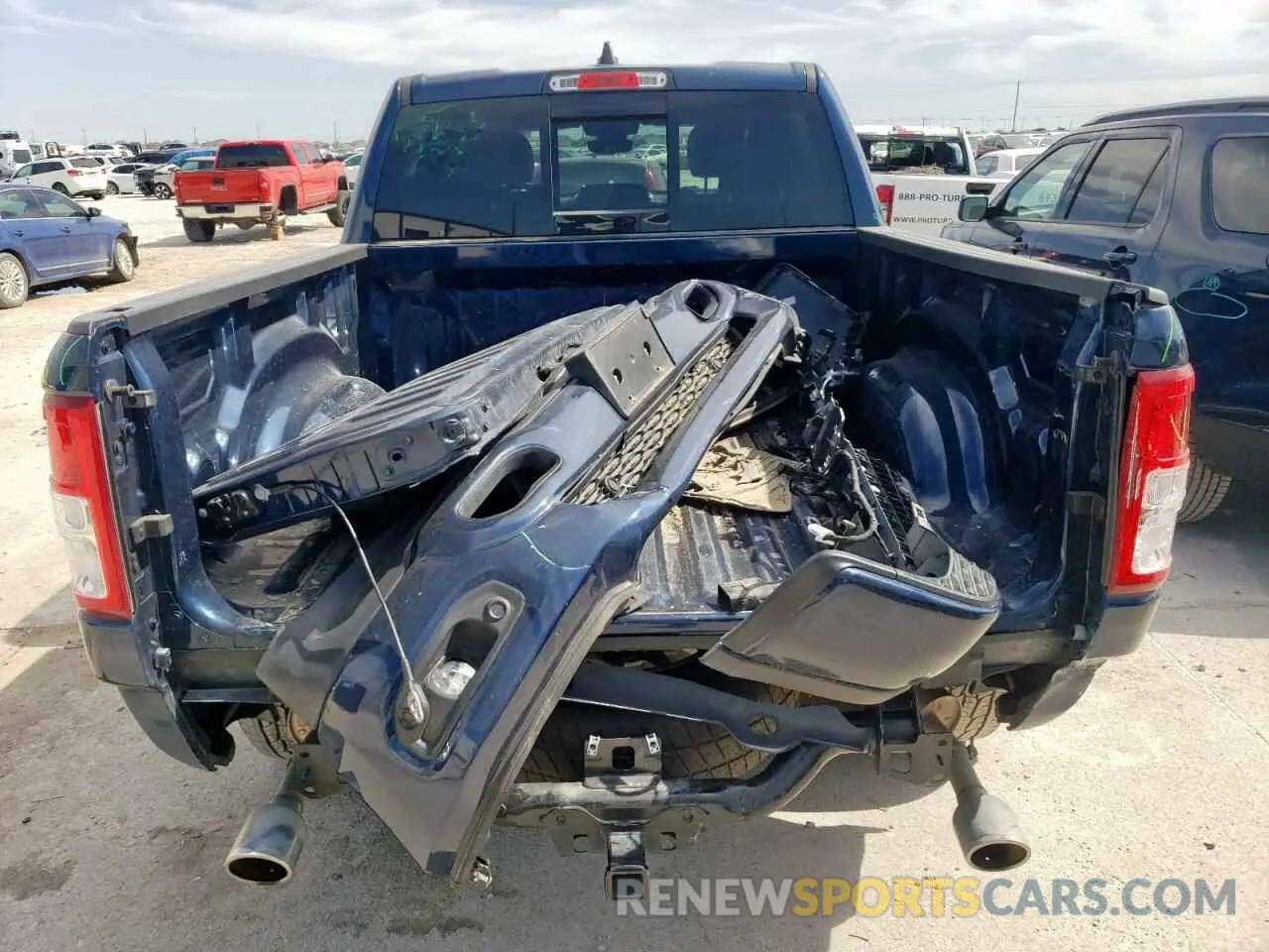 6 Photograph of a damaged car 1C6SRFFT0NN379571 RAM 1500 2022