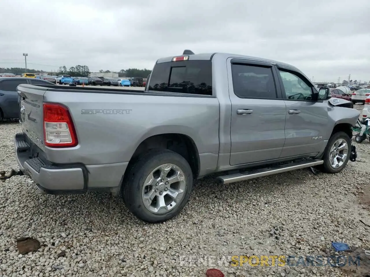 3 Photograph of a damaged car 1C6SRFFT0NN477547 RAM 1500 2022