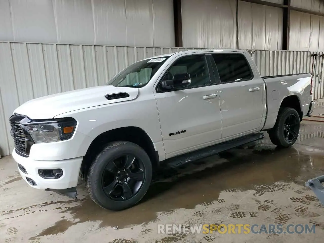 1 Photograph of a damaged car 1C6SRFFT1NN137100 RAM 1500 2022