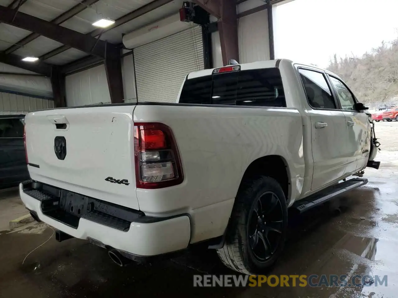 3 Photograph of a damaged car 1C6SRFFT1NN137100 RAM 1500 2022