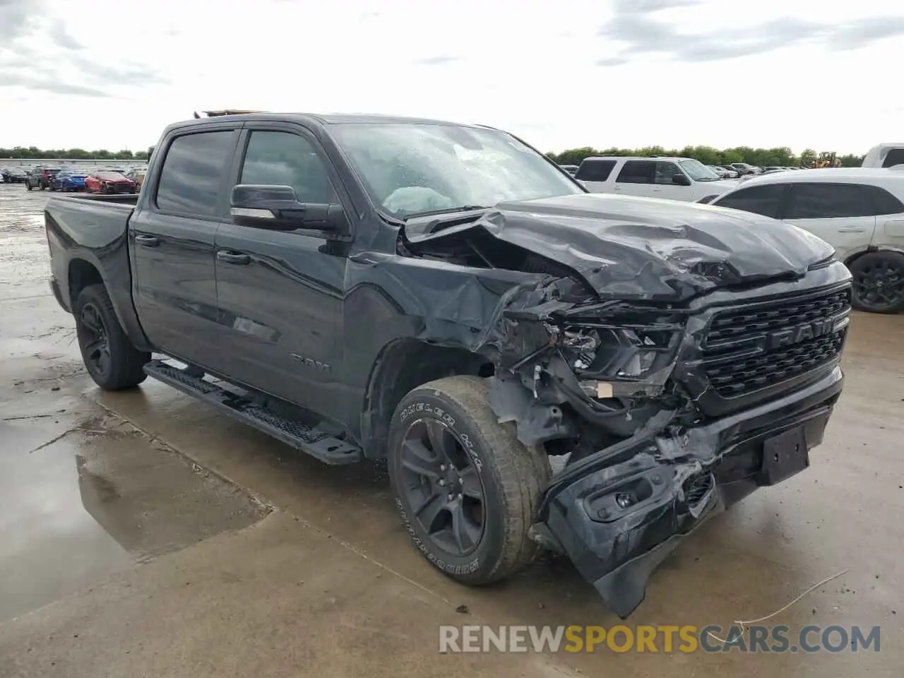 4 Photograph of a damaged car 1C6SRFFT1NN313174 RAM 1500 2022
