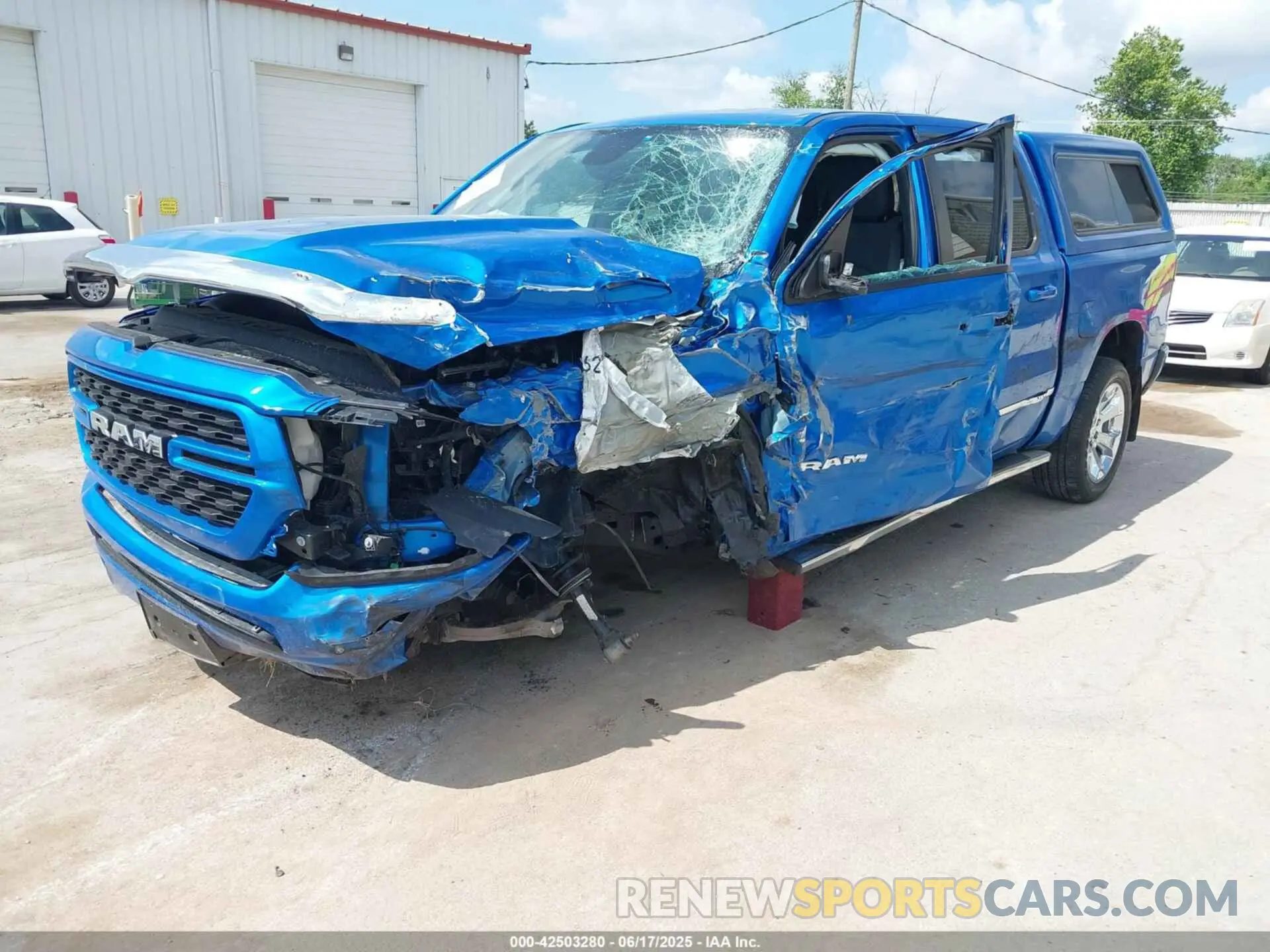 2 Photograph of a damaged car 1C6SRFFT1NN401769 RAM 1500 2022
